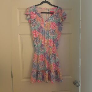 Lilly Pulitzer Smock Waist Flutter Sleeve Romper in Colorful Coral print